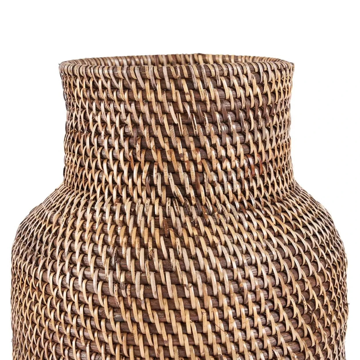 Close-up of a woven rattan vase on a white background
