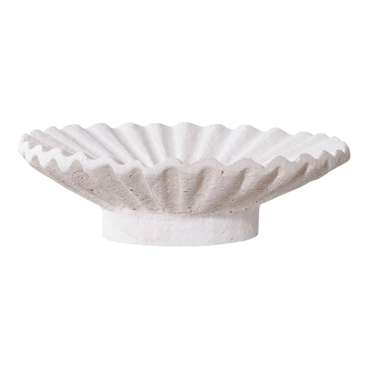 Concrete bowl with a textured, scalloped design on a white background.
