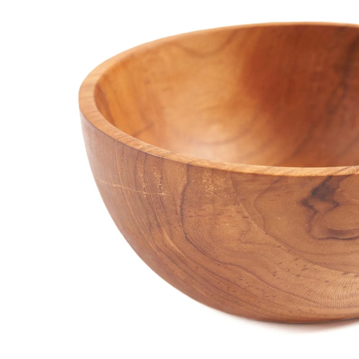 Wooden bowl on a white background