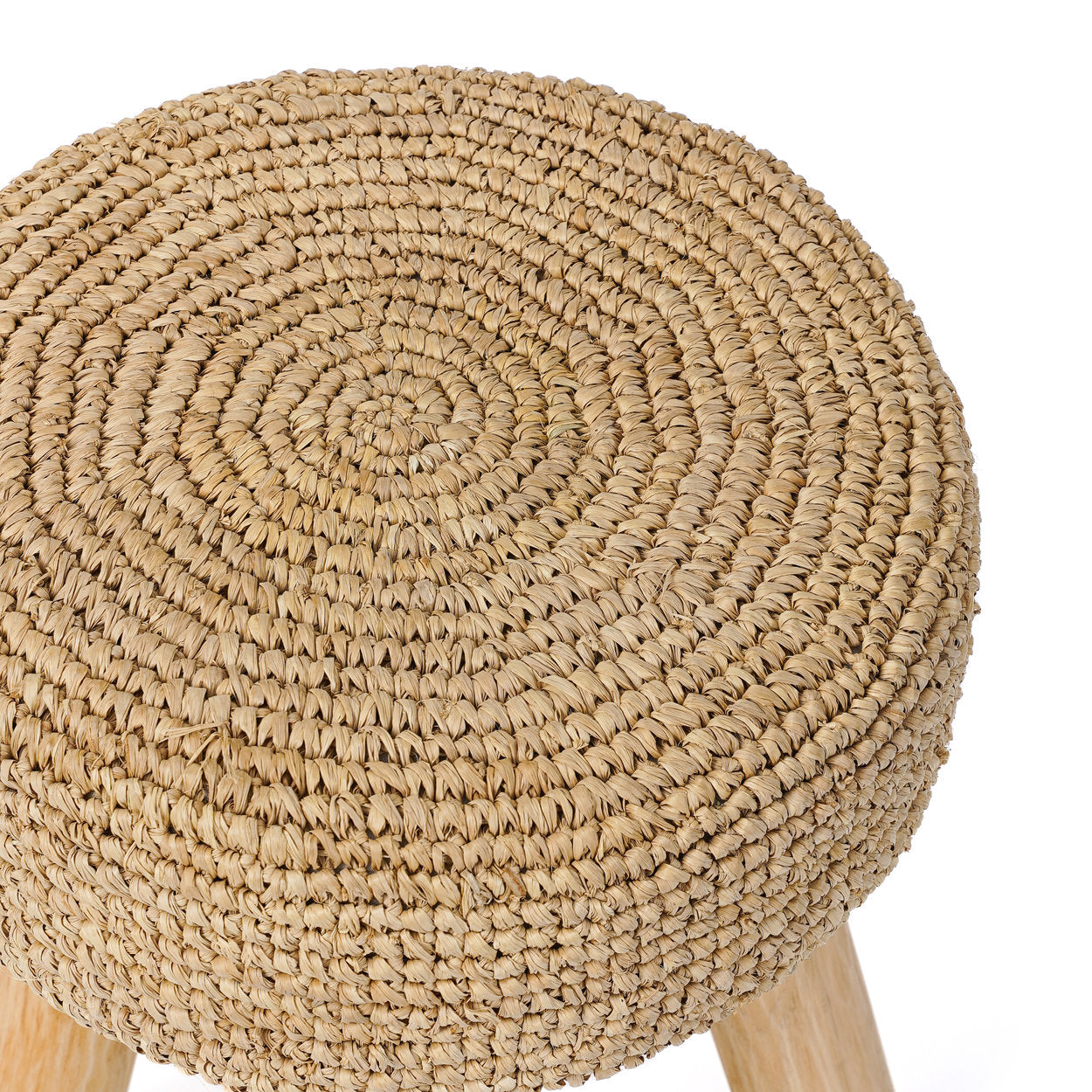 Round woven stool with natural fiber texture on a white background