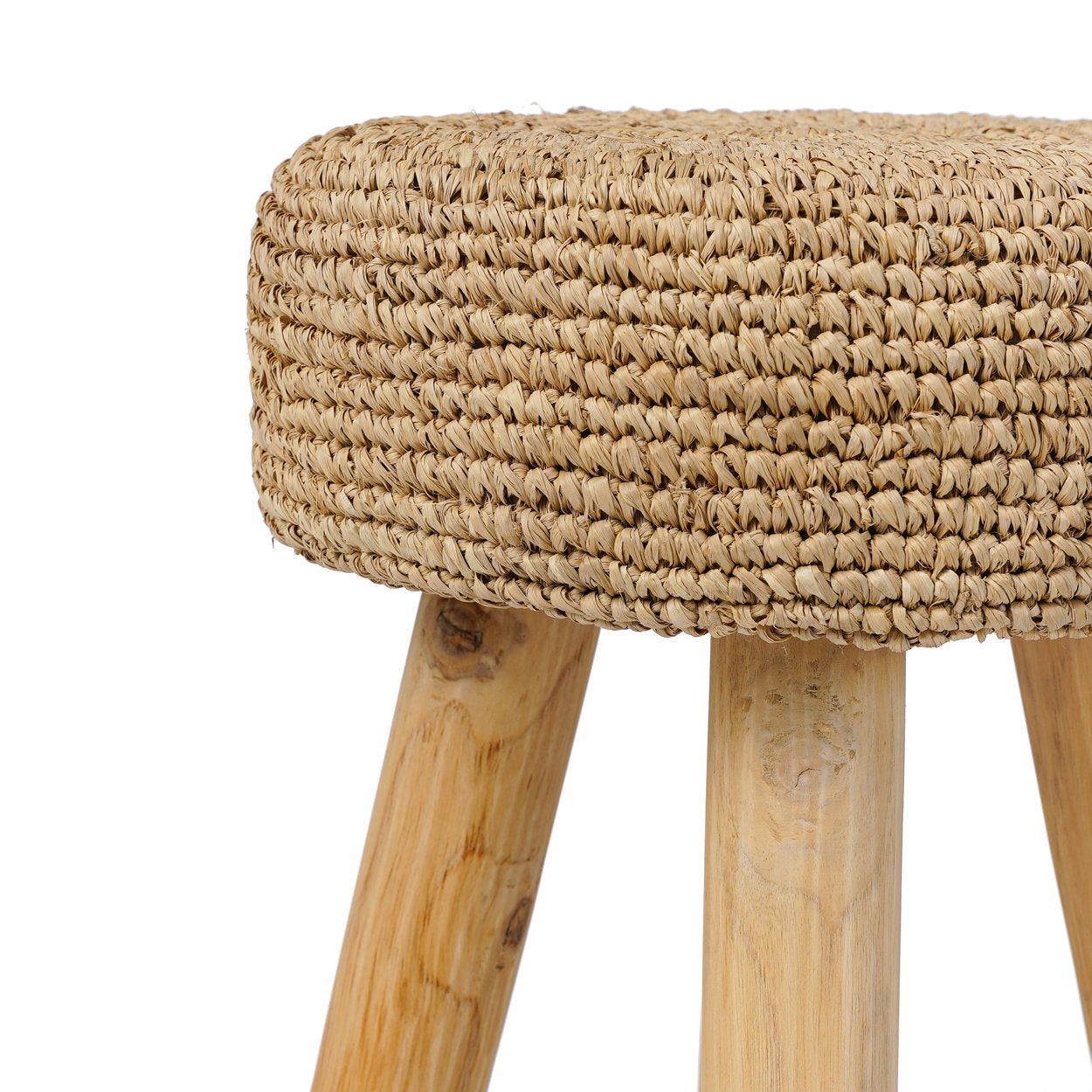 Woven stool with wooden legs on a white background