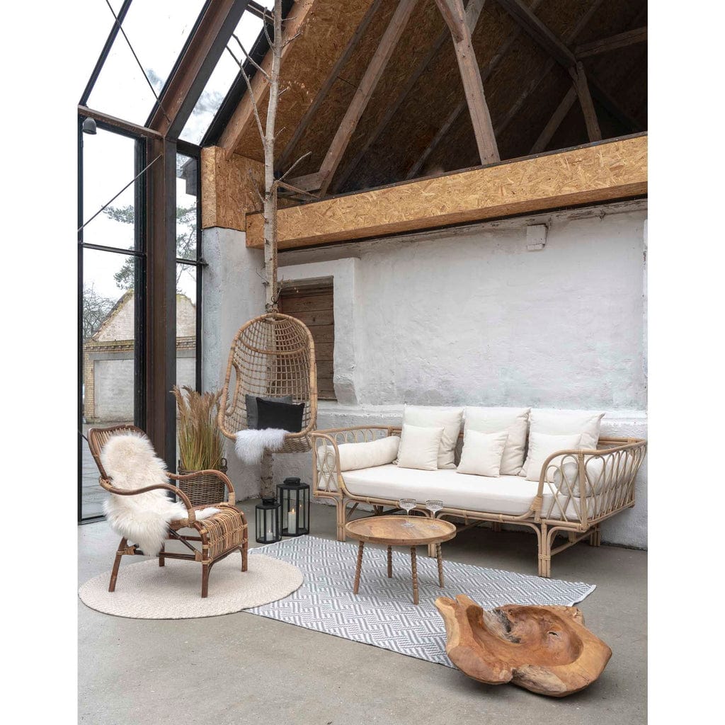 Natural mango wood coffee table in modern home decor setting, round Ø60x35 cm.