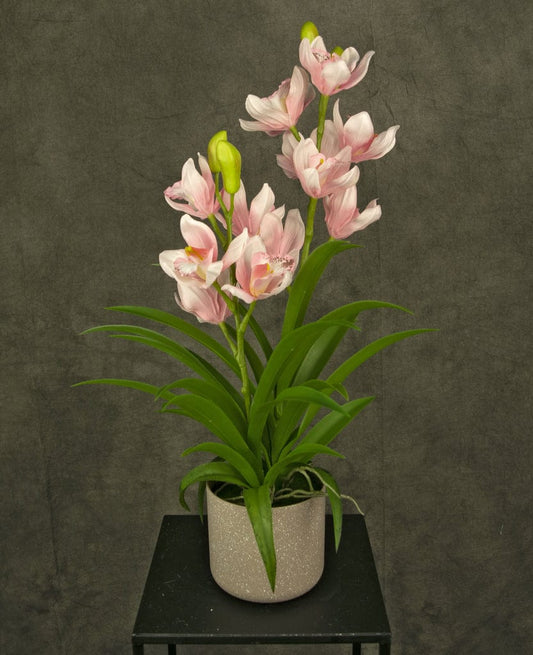 "Image: Artificial Pink Orchid in a white pot, ideal for elegant home or office decor."