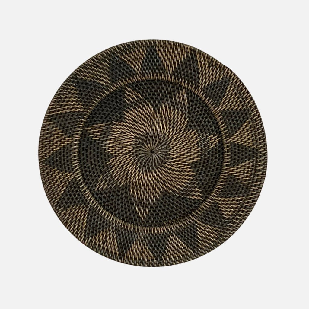"Intricately woven handcrafted rattan wall plates for tribal and bohemian-inspired home decor."