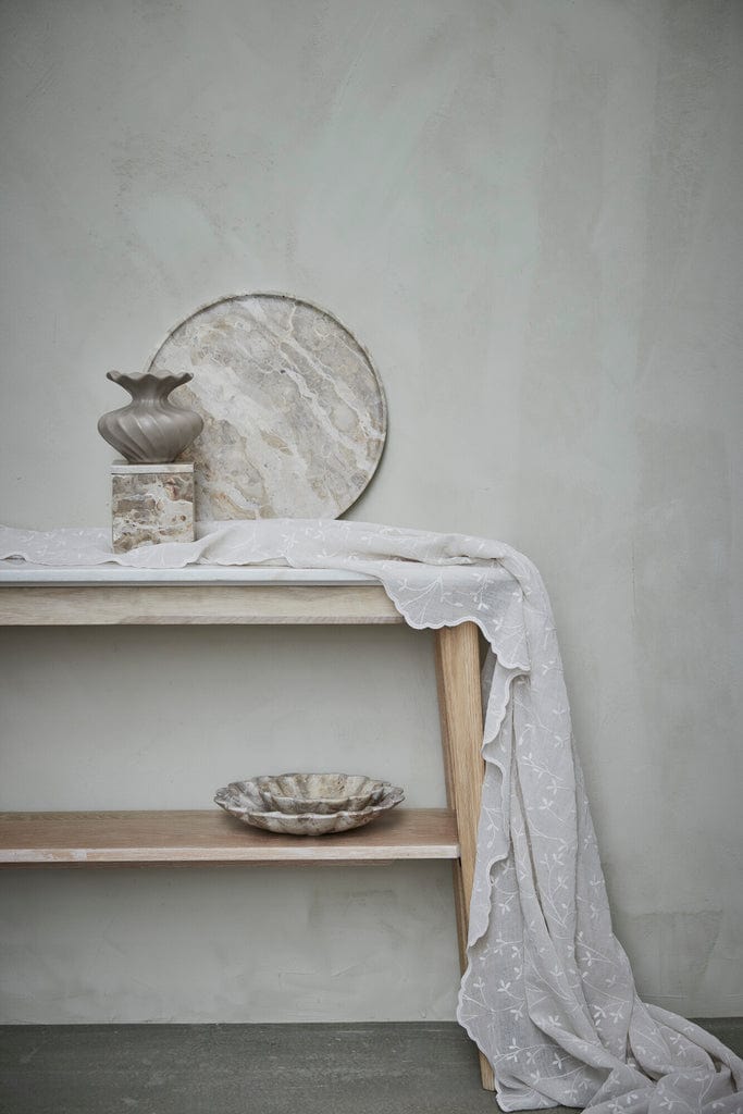Ellia Marble Tray Ø40cm Linen on display with elegant decor.