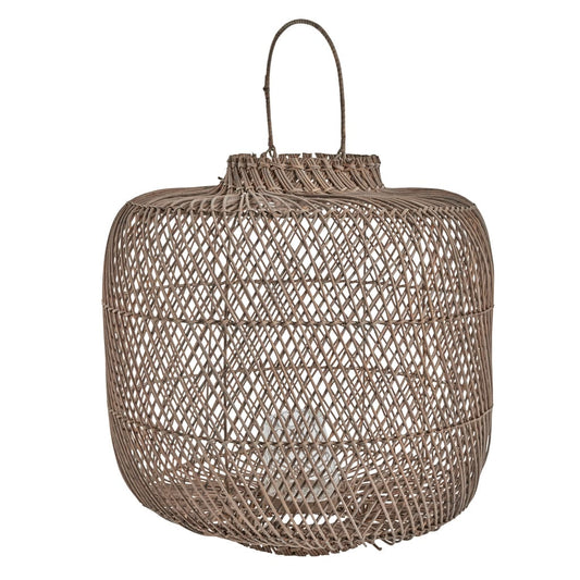 Handcrafted rattan lantern emitting warm glow, ideal for cozy ambiance and elegant home decor.