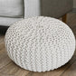 Chunky knit pouf in white, Ø 55 cm x H 37 cm.