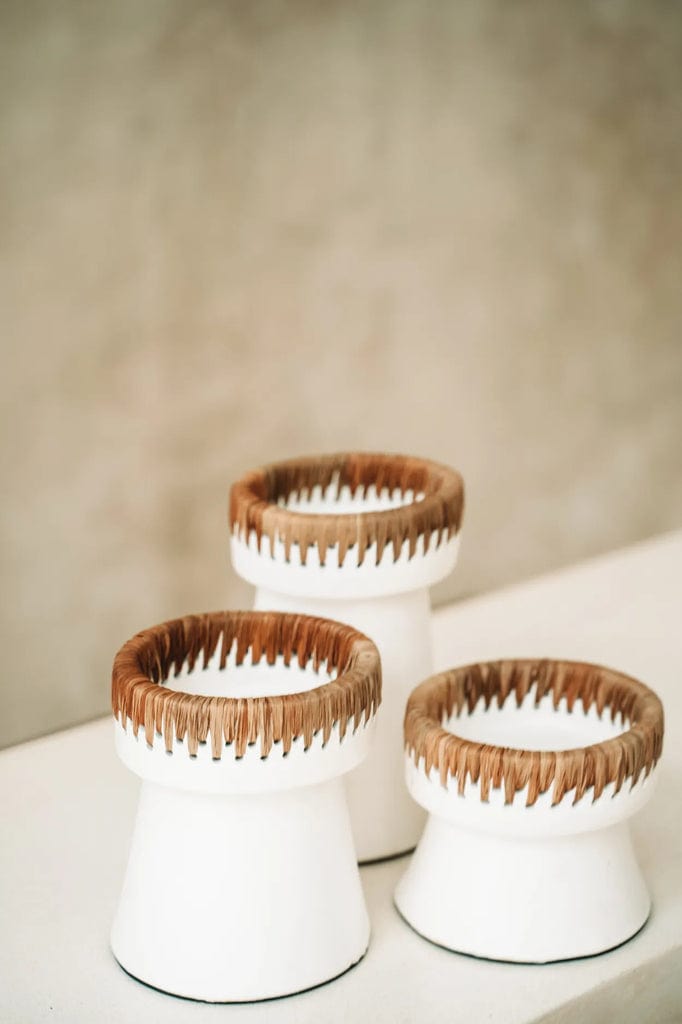 Pretty Candle Holder in white terracotta with raffia accent, stylish decor piece for tables or consoles.