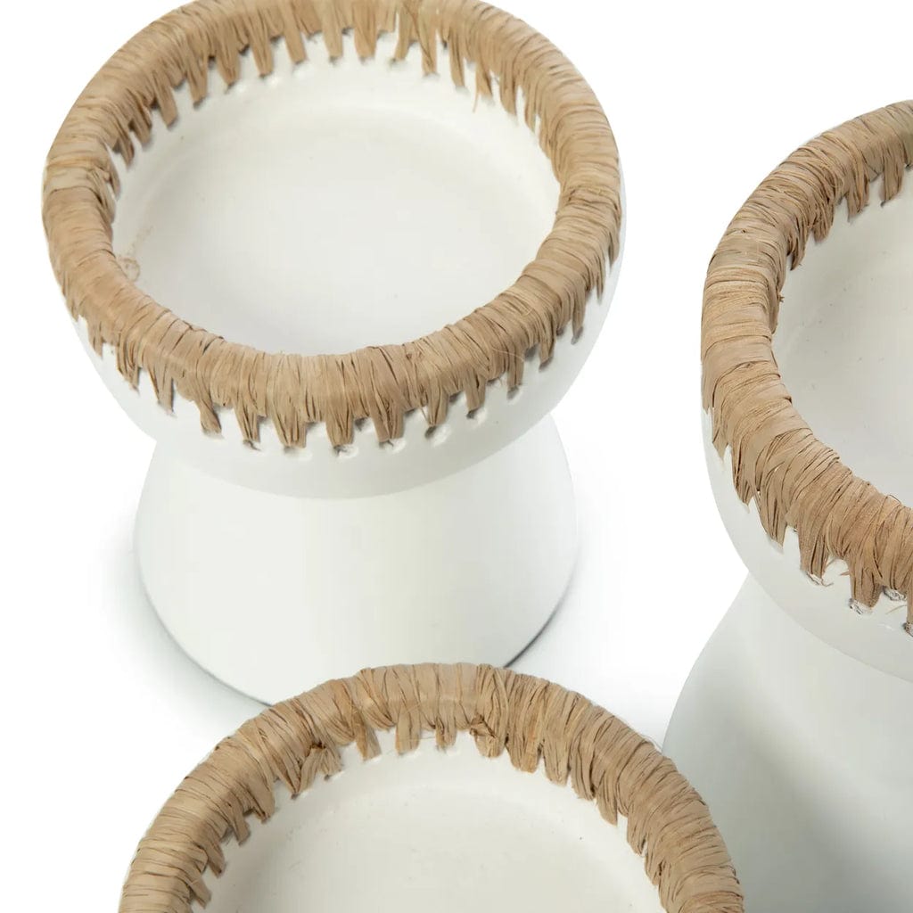Pretty candle holder in white terracotta with raffia accent, small size.