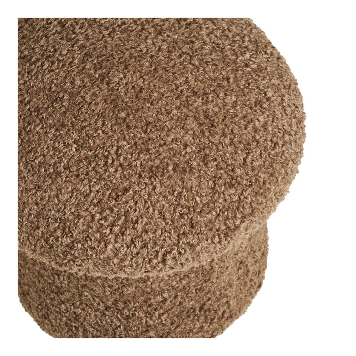 Brown textured cylindrical object on a white background