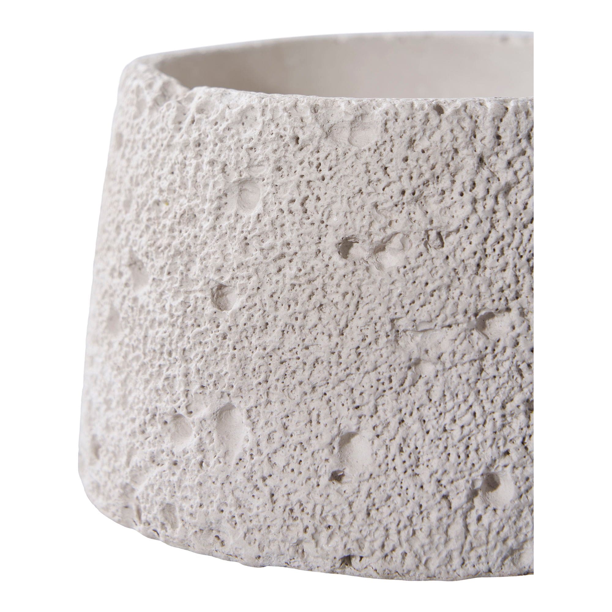 Textured ceramic planter on a white background