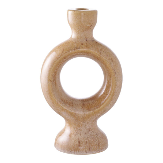 Brown ceramic candle holder with sculptural shape .