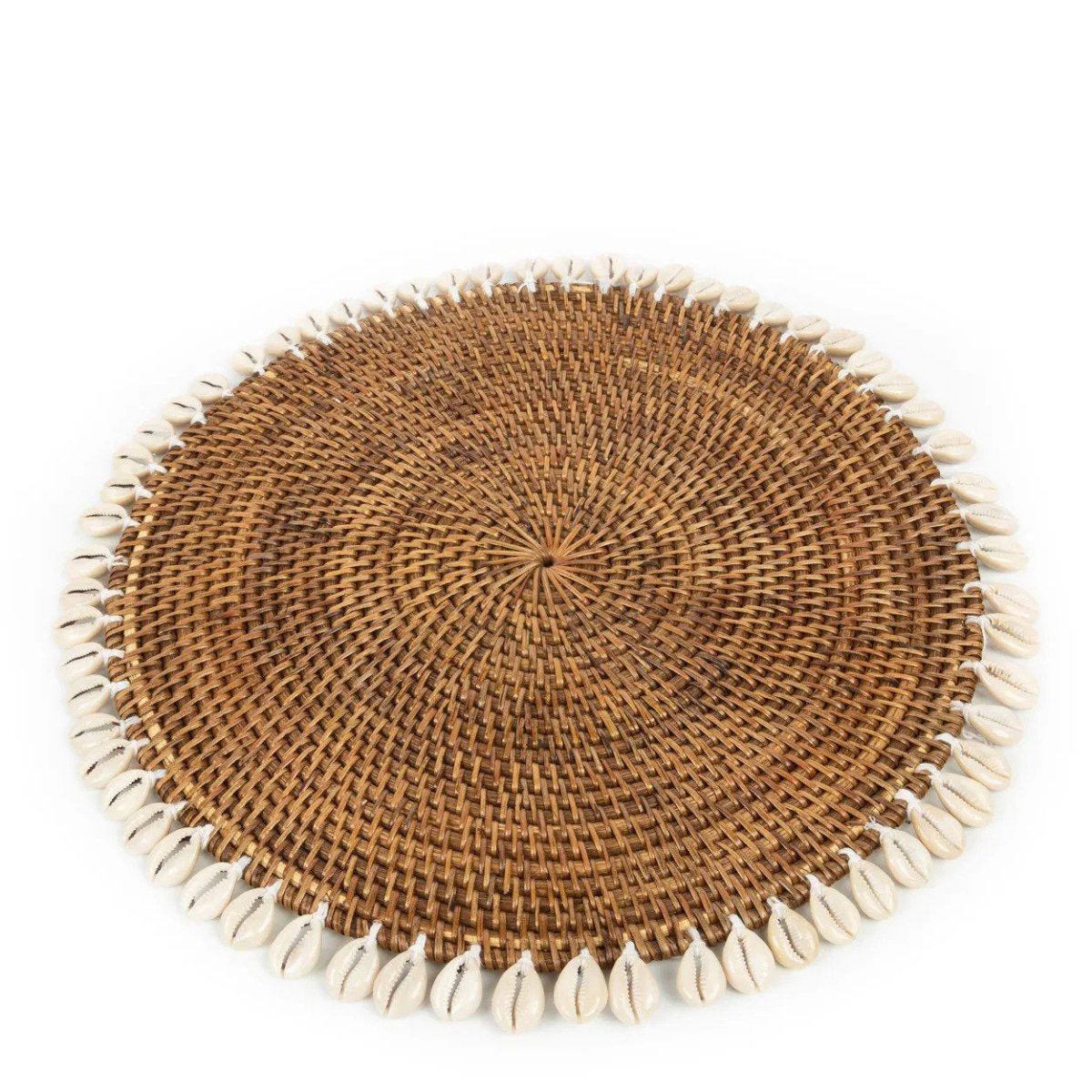 Round woven placemat with shell trim on a white background