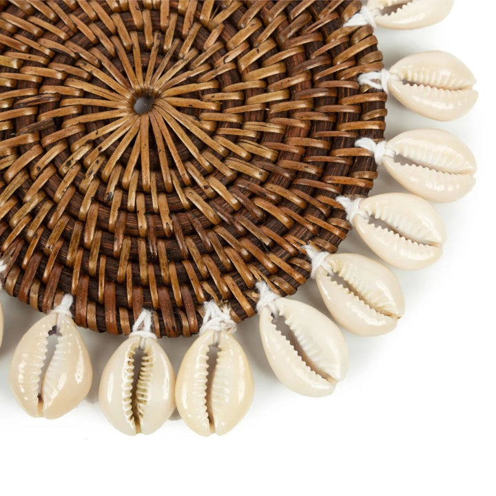  Woven mat with cowrie shells.