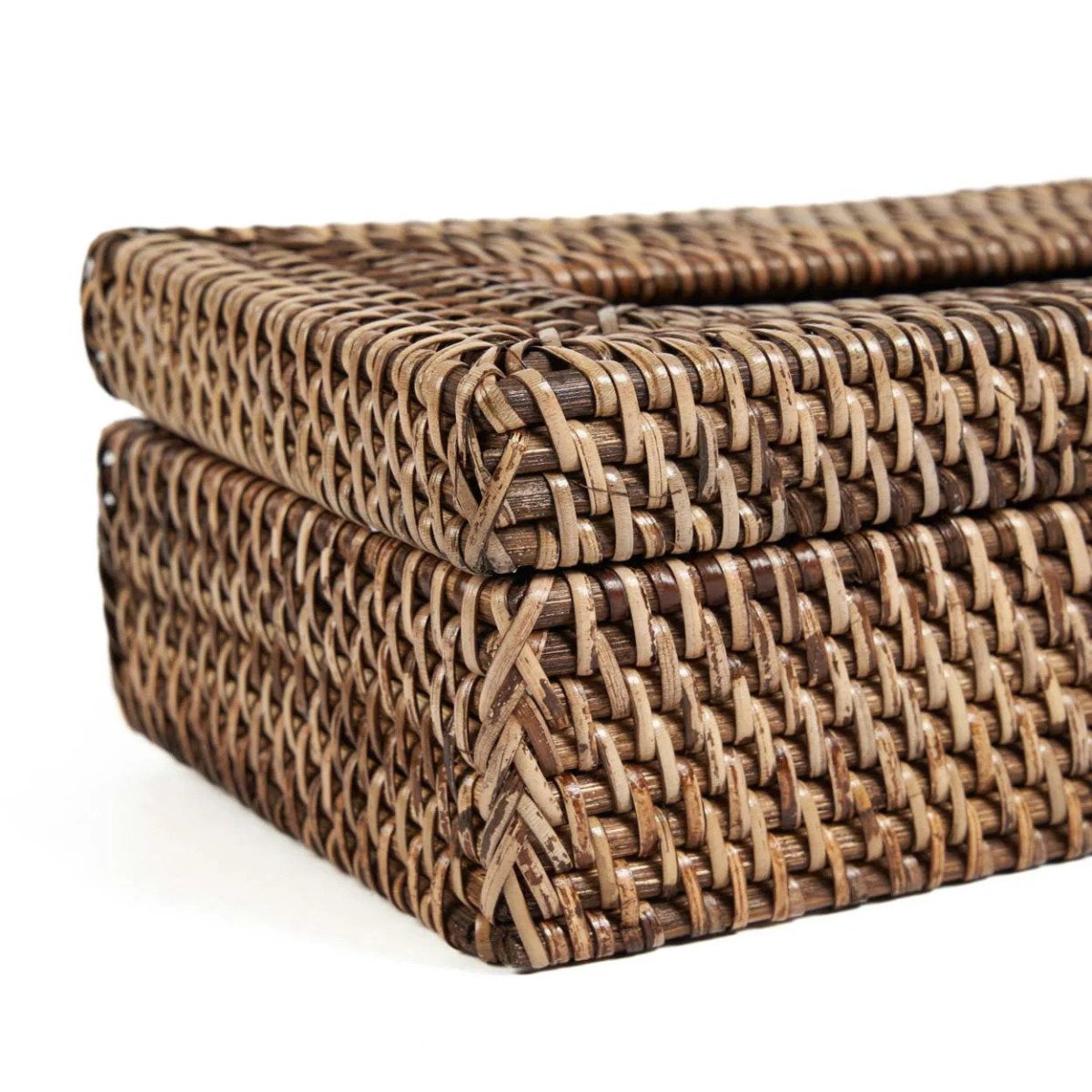 Stack of woven rattan boxes on a white background