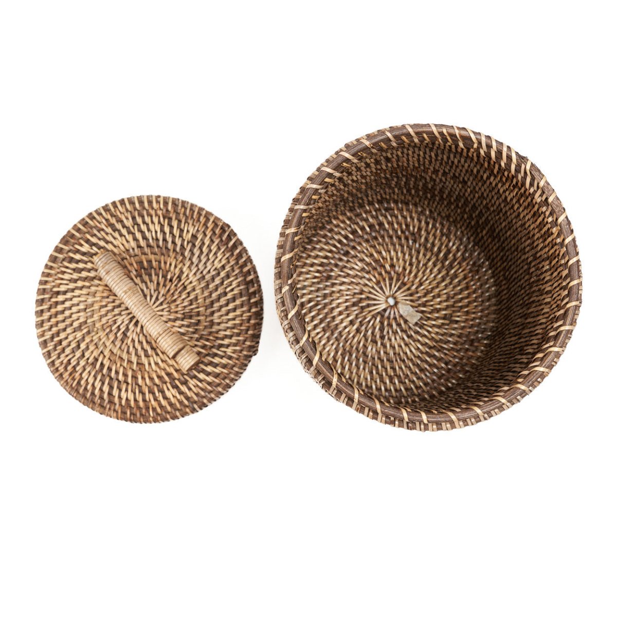 Two woven baskets, one round and one with a handle, on a white background
