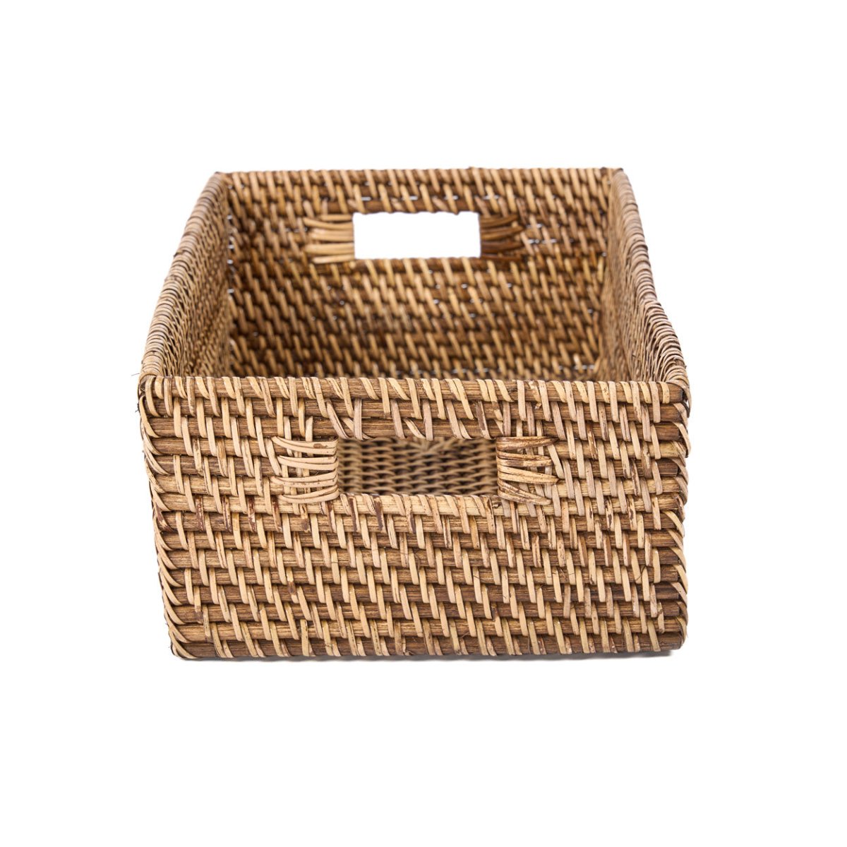 Woven rattan basket on a white background