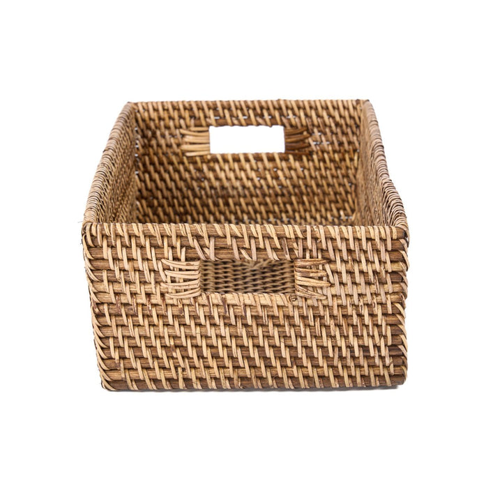 Woven rattan basket on a white background