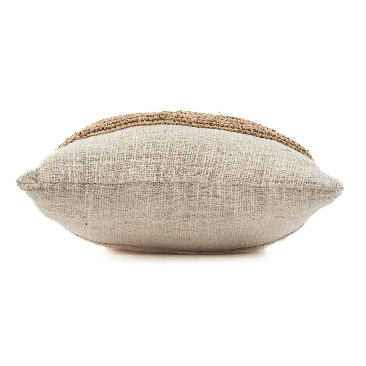 Textured pillow with a natural color scheme on a white background