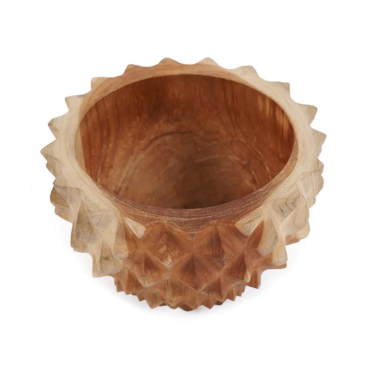 Wooden bowl with textured rim on a white background