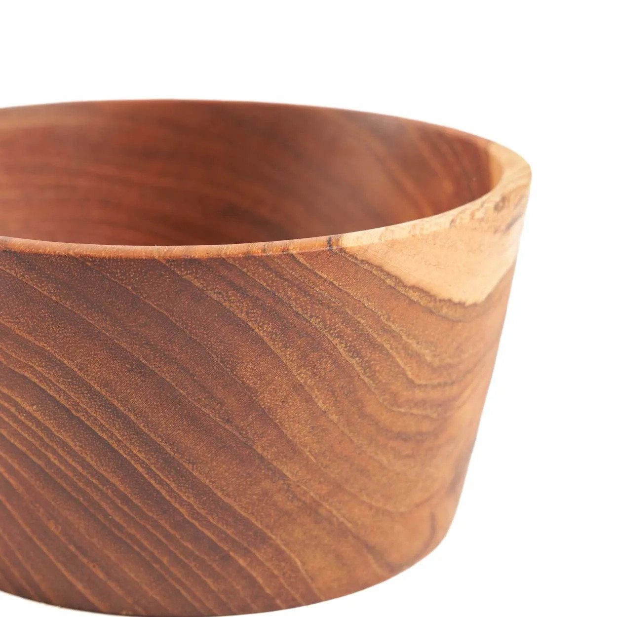Wooden bowl with a natural finish on a white background
