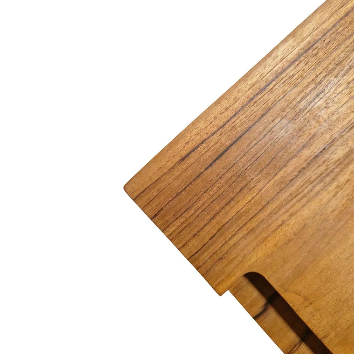 Close-up of a wooden surface with a visible grain pattern on a white background