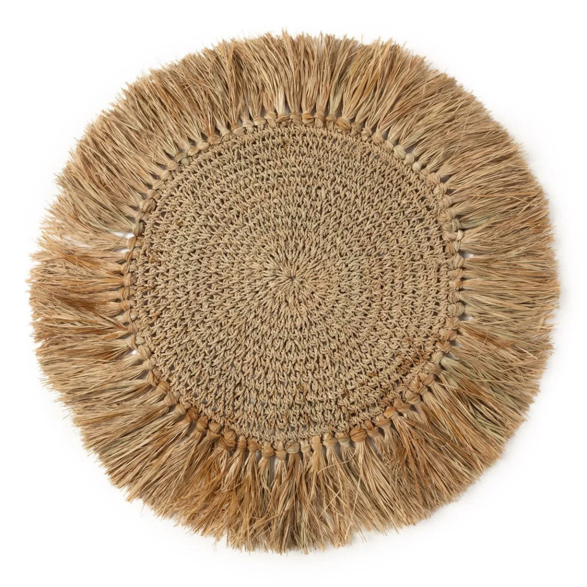Round woven mat with fringed edge on a white background