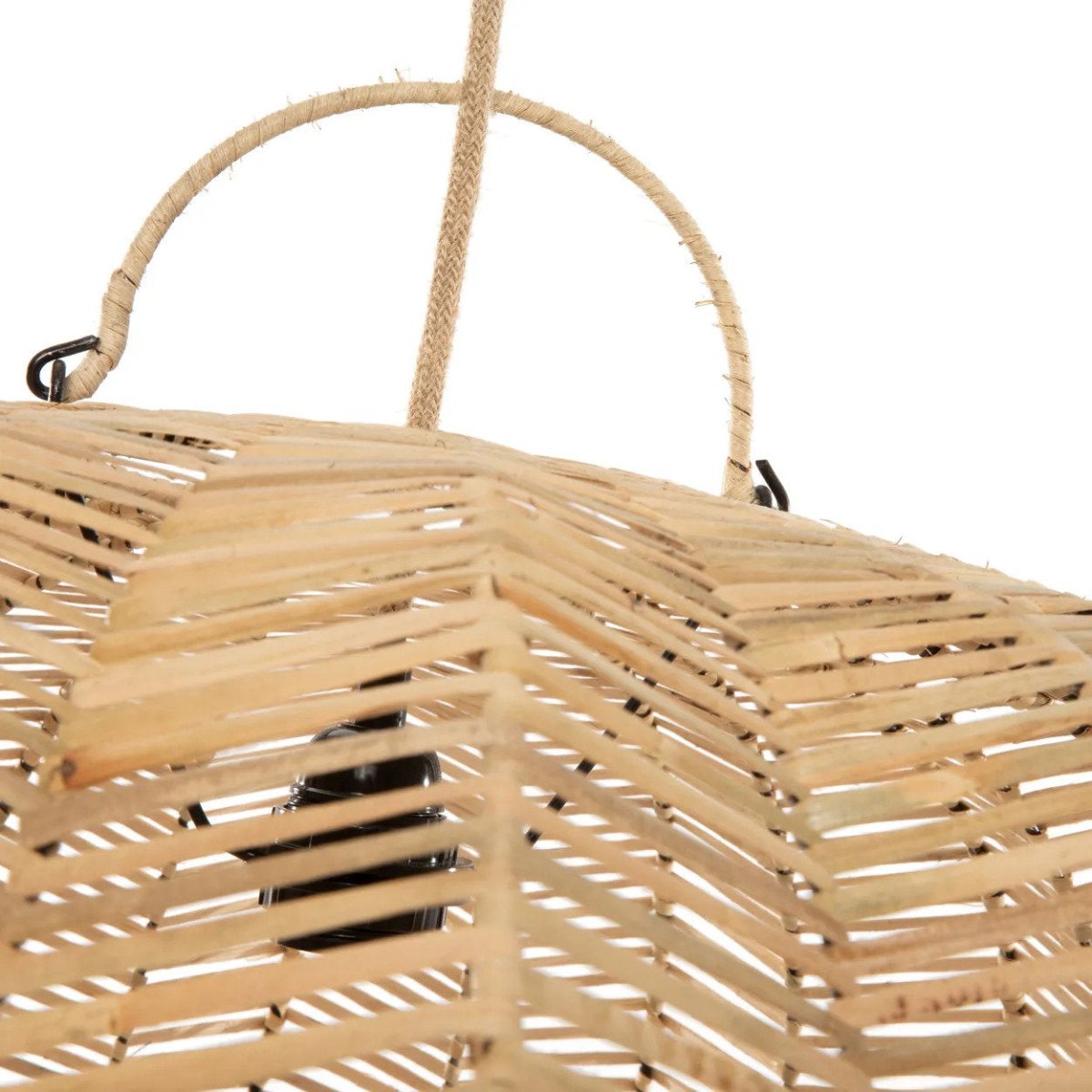 Close-up of a wicker basket with a handle on a white background