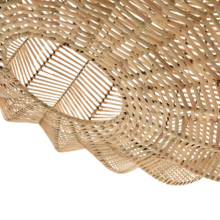 Close-up of a woven rattan ceiling light fixture