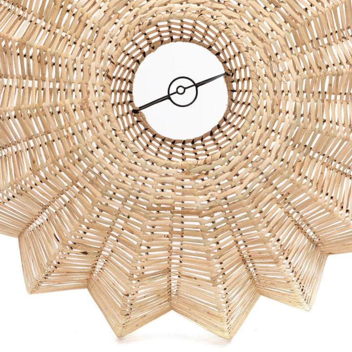 Inside of woven rattan lampshade on white background 