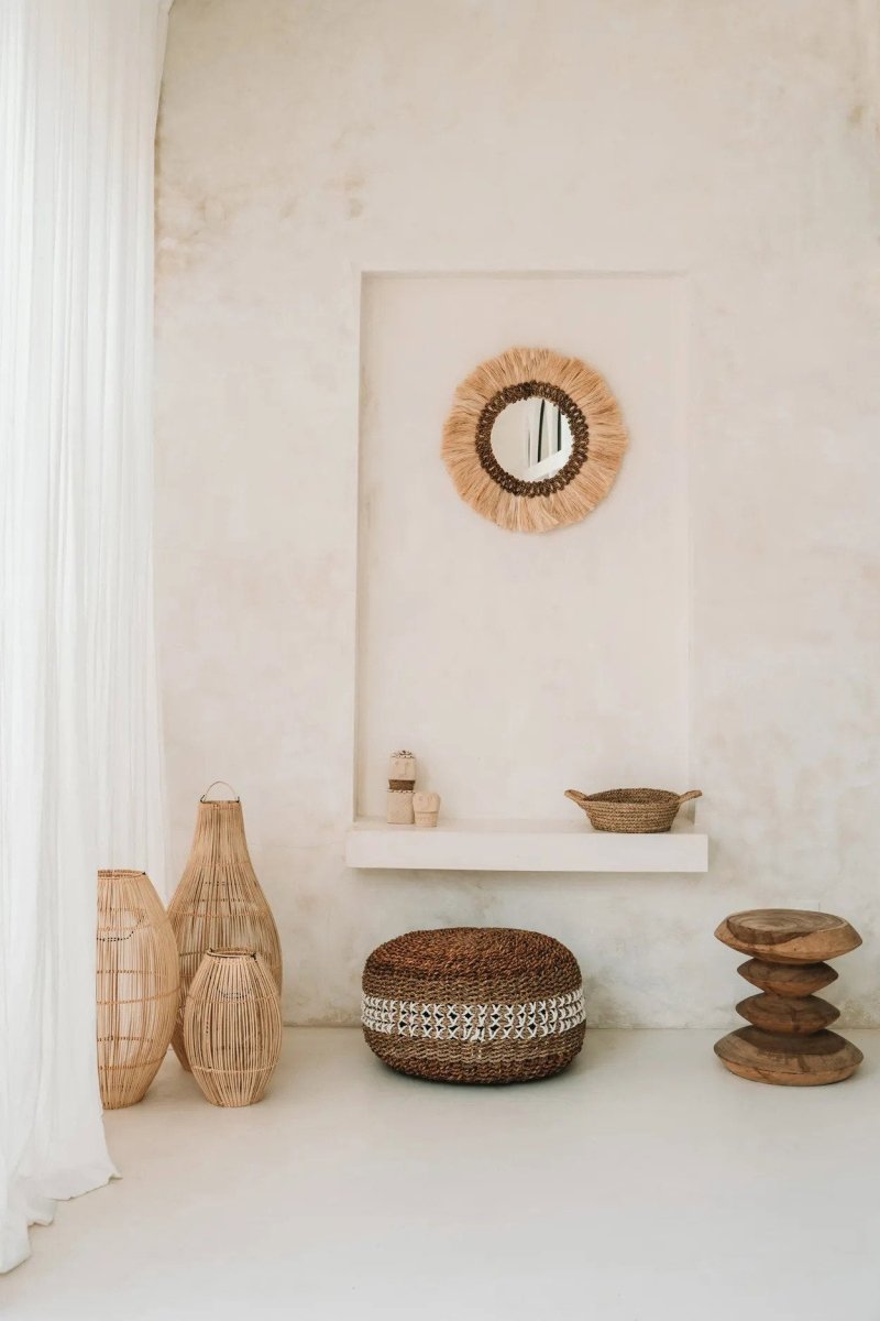 Nautical-themed room with wooden decor elements on a white wall.