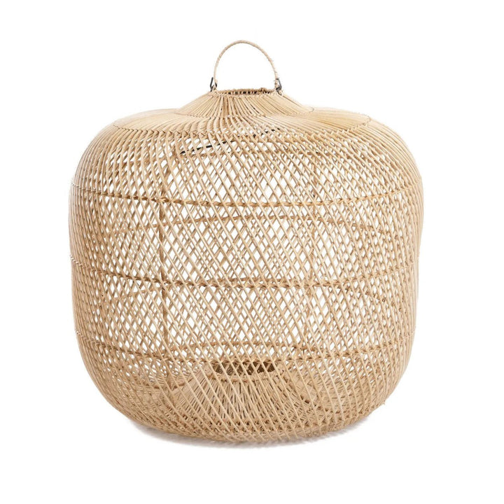 Woven natural material basket on a white background