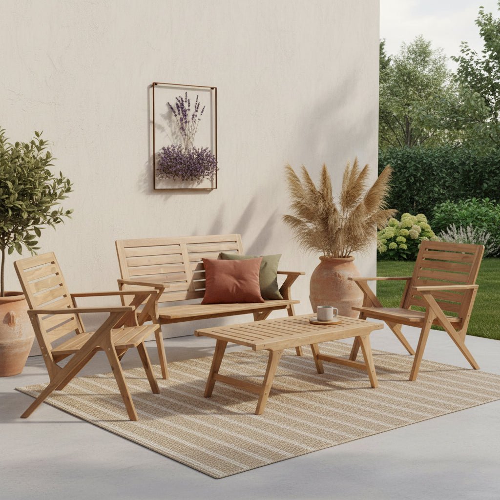 Outdoor patio set with wooden chairs, table, and cushions on a rug.