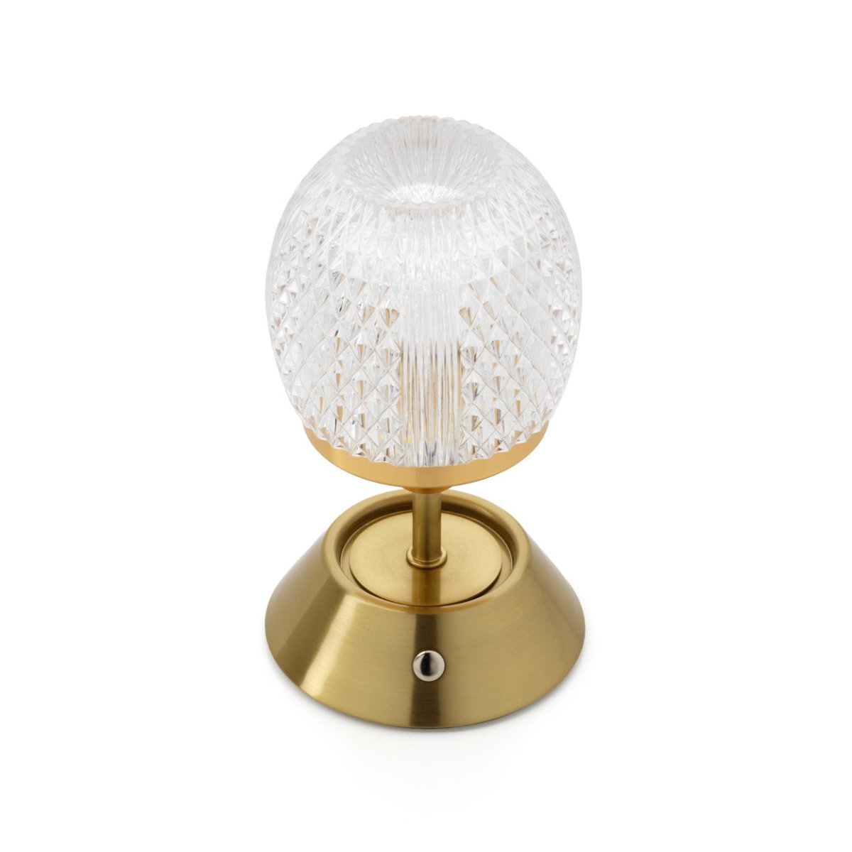 Decorative lamp with a gold base and textured glass shade on a white background
