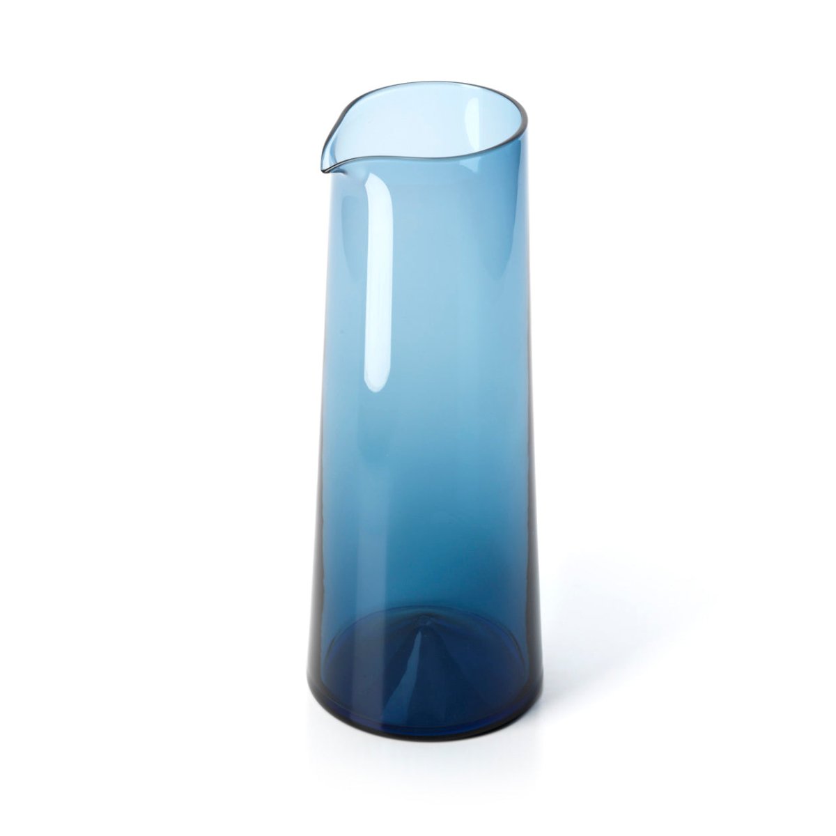 Blue glass carafe on a white background