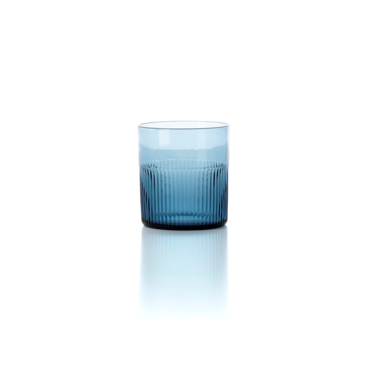 Blue glass tumbler on a white background
