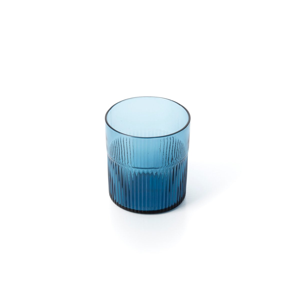 Blue glass tumbler on a white background