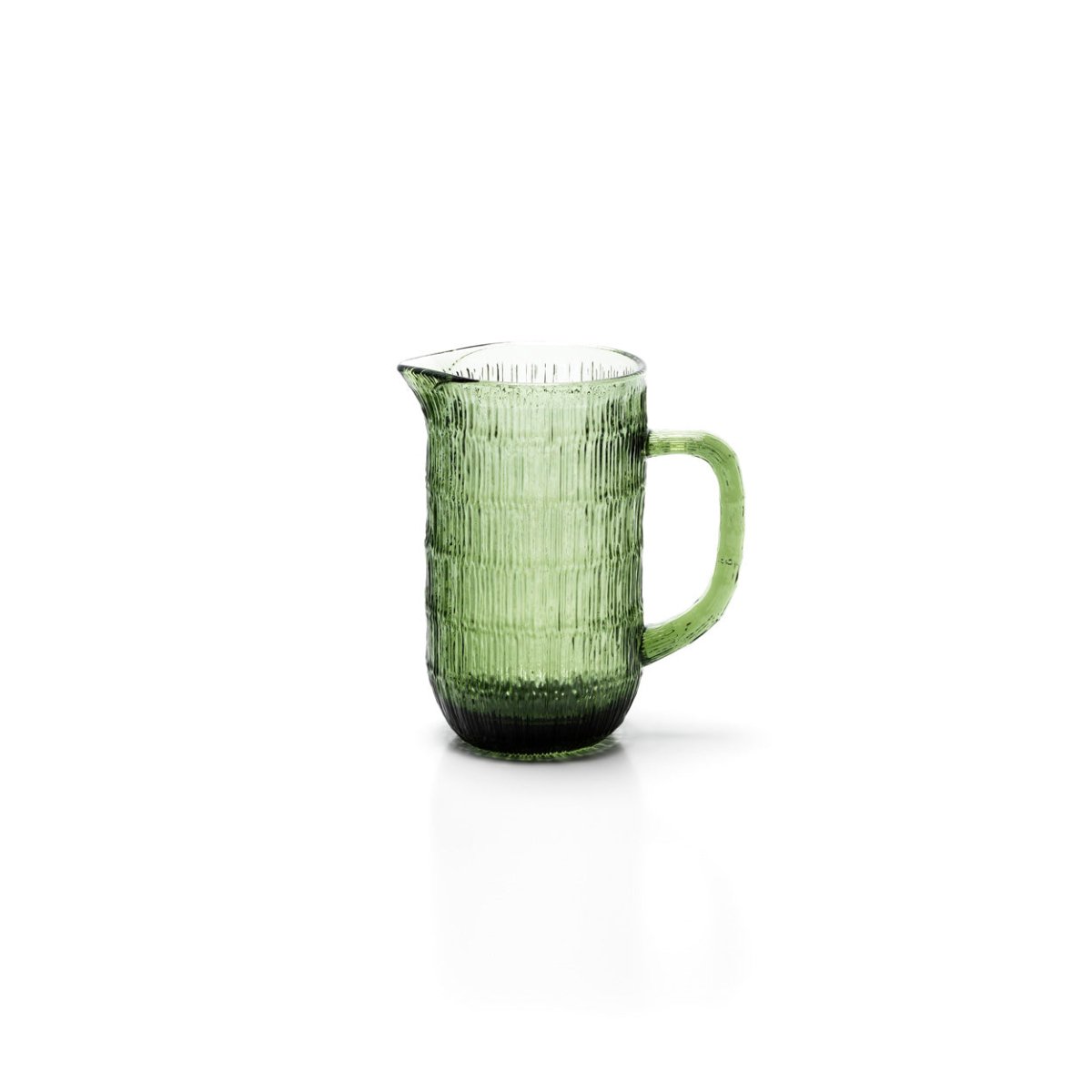 Green glass pitcher on a white background