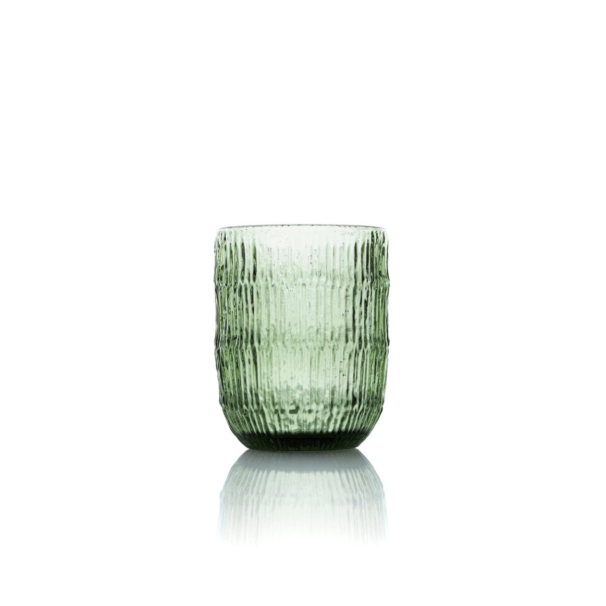 Green textured glass tumbler on a white background