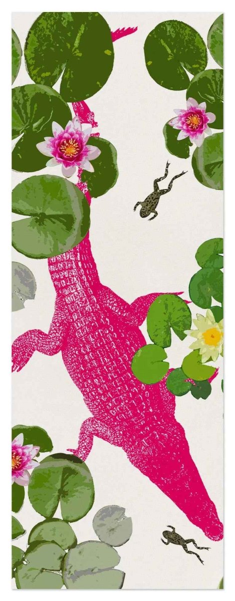 Pink alligator among lily pads and frogs on a white background