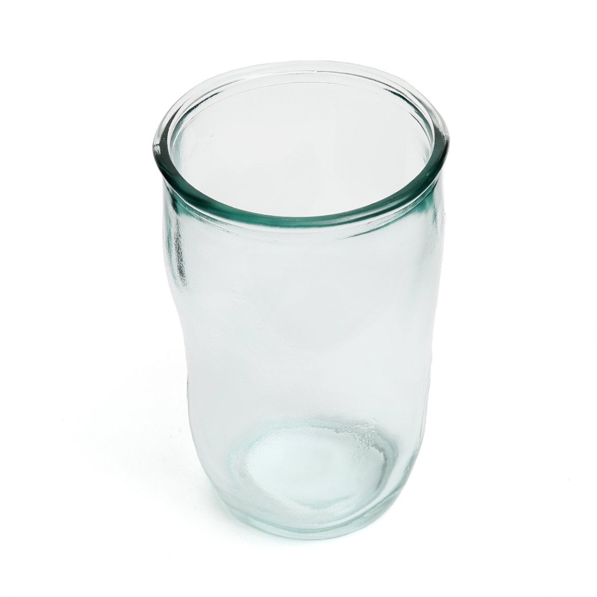 Clear glass tumbler on a white background