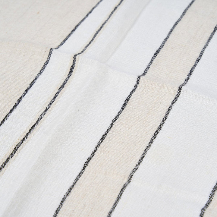 Close-up of a fabric with black and white striped pattern