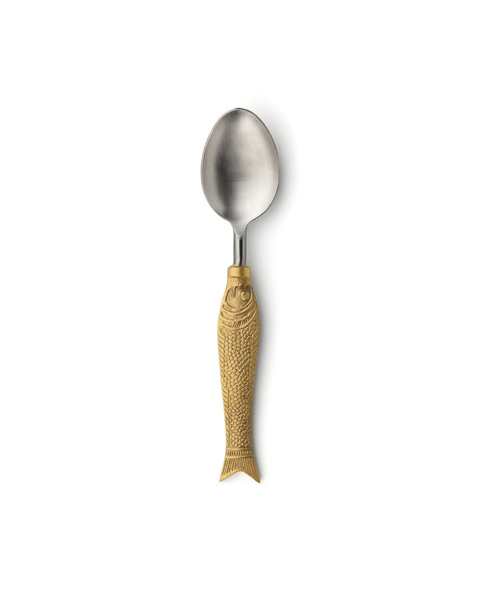Spoon with gold fish handle on a white background