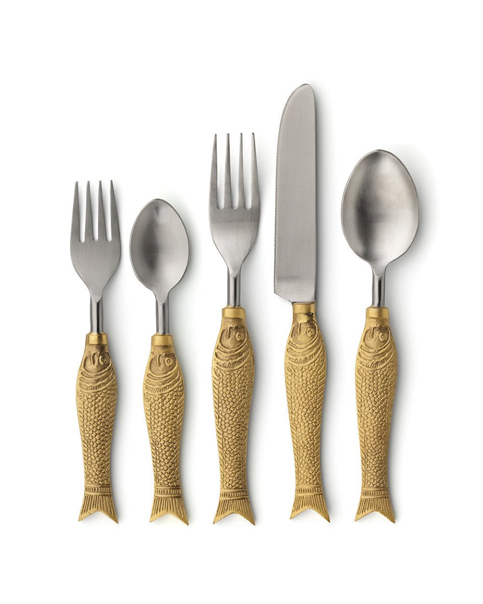 Set of silver cutlery with fish-shaped handles on a white background