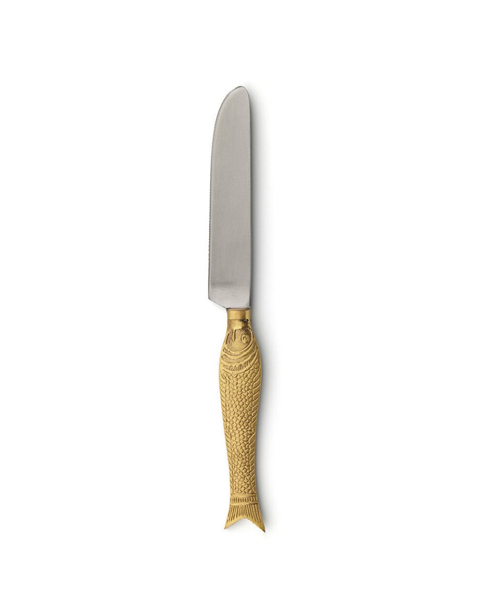 Knife with a gold handle on a white background