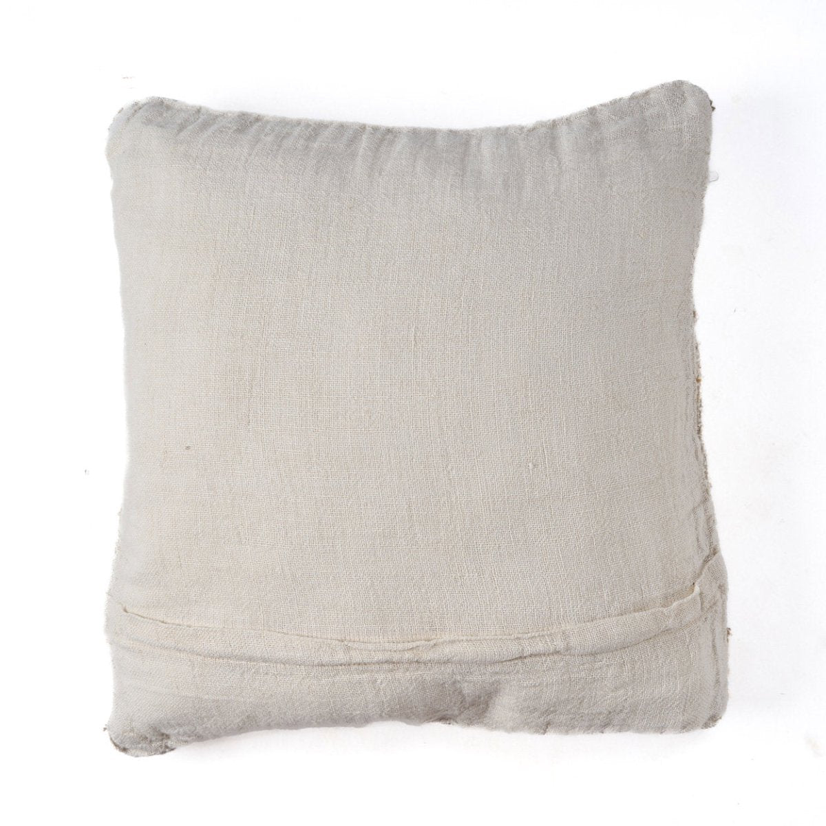 Textured beige pillow on a white background