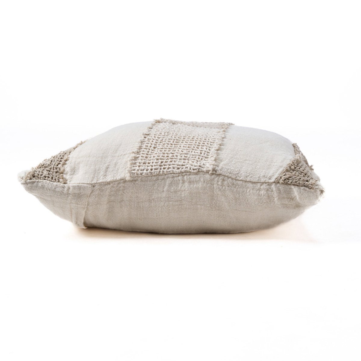 Textured pillow with a checkered pattern on a white background