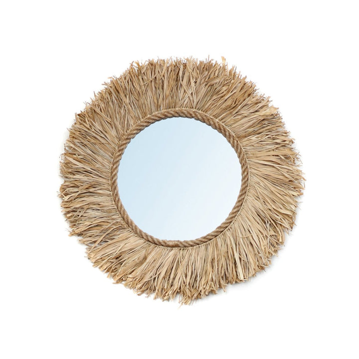 Round mirror with a natural raffia frame on a white background