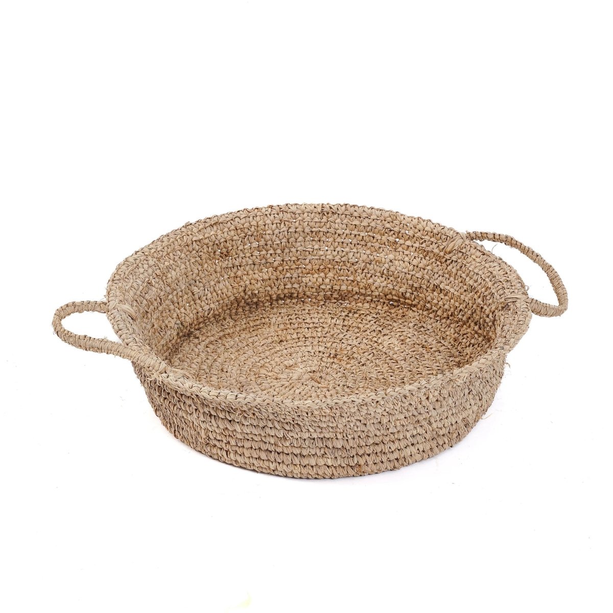 Woven basket with handles on a white background