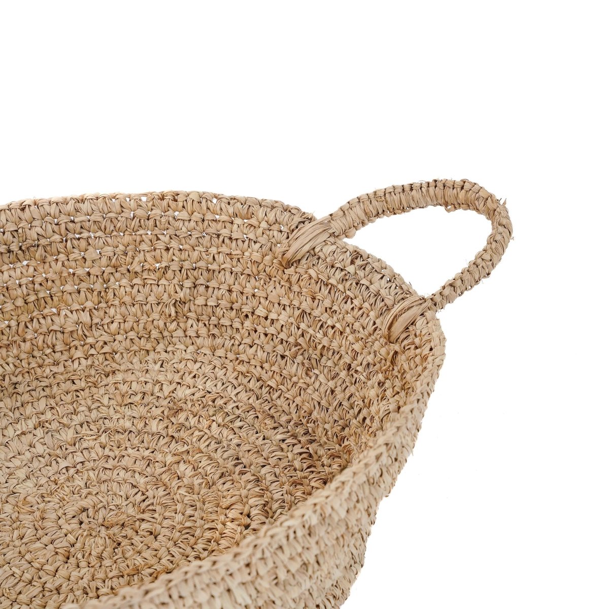 Woven basket with handles on a white background